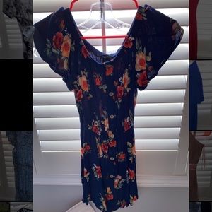 Cute off the shoulder dress.